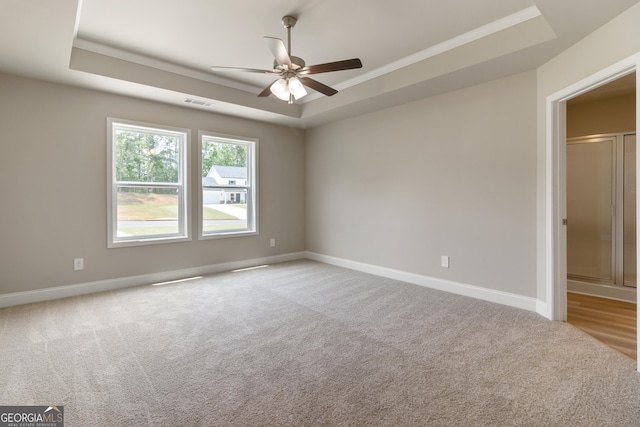 215 Davis Lake Ct Lot 2, Thomaston, GA 30286 - carpeted spare room with a tray ceiling, baseboards, a ceiling fan, and ornamental molding