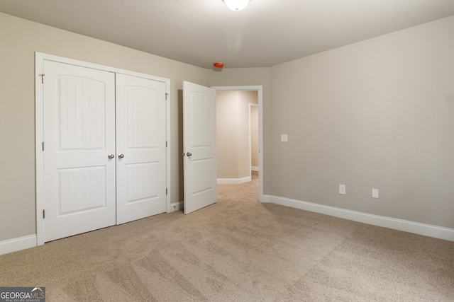 215 Davis Lake Ct Lot 2, Thomaston, GA 30286 - unfurnished bedroom with carpet, a closet, and baseboards