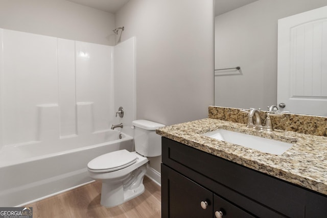 215 Davis Lake Ct Lot 2, Thomaston, GA 30286 - bathroom featuring vanity, wood finished floors, toilet, shower / washtub combination, and baseboards