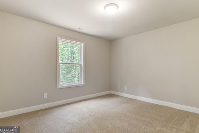 215 Davis Lake Ct Lot 2, Thomaston, GA 30286 - empty room with light colored carpet and baseboards