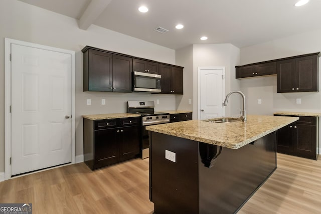 215 Davis Lake Ct Lot 2, Thomaston, GA 30286 - kitchen featuring appliances with stainless steel finishes, a sink, light wood-style floors, recessed lighting, and light stone countertops