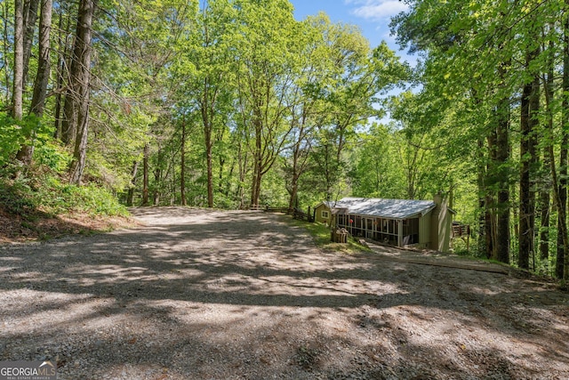 8378 Dillard Rd, Scaly, NC 28775 - view of dirt / gravel road featuring a forest view