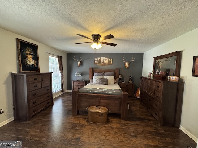 281 Cambridge Cir, Kingsland, GA 31548 - bedroom featuring dark wood finished floors, a textured ceiling, and ceiling fan