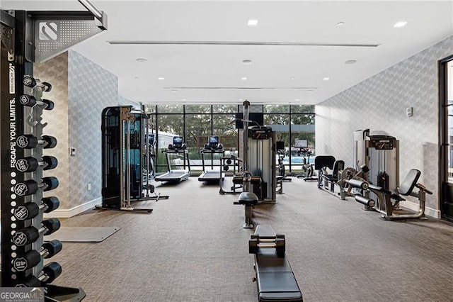 2520 Peachtree Rd Unit 403, Atlanta, GA 30305 - exercise room with wallpapered walls, a wall of windows, and carpet
