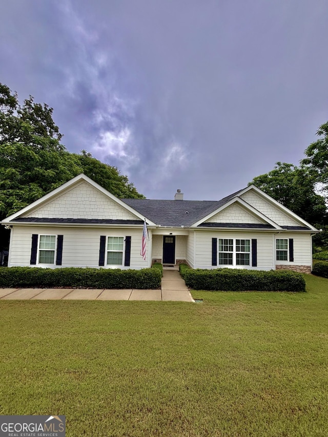 523 Huntleigh Dr, Winder, GA 30680 - ranch-style home featuring a front lawn and a chimney