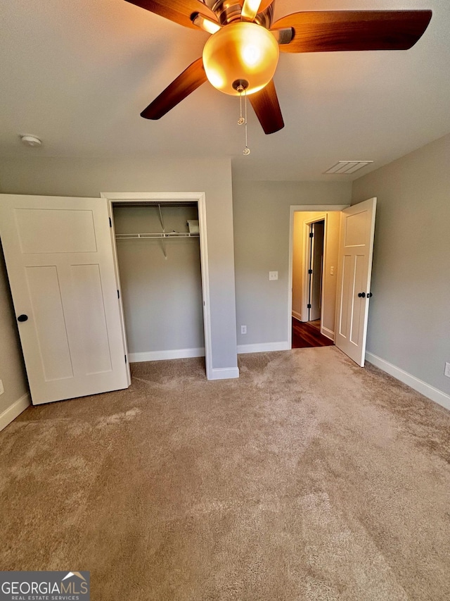523 Huntleigh Dr, Winder, GA 30680 - unfurnished bedroom featuring carpet, baseboards, and a closet