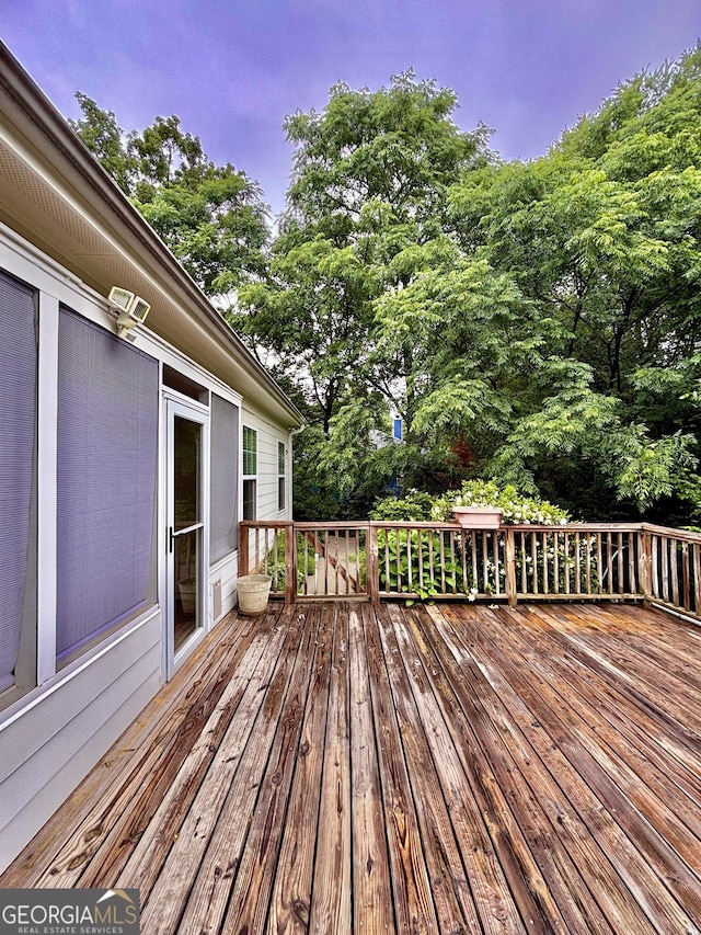523 Huntleigh Dr, Winder, GA 30680 - deck featuring view of wooded area