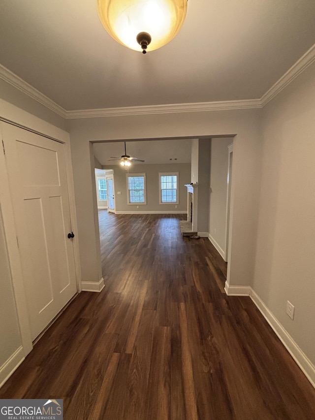 523 Huntleigh Dr, Winder, GA 30680 - corridor with baseboards, dark wood finished floors, and crown molding