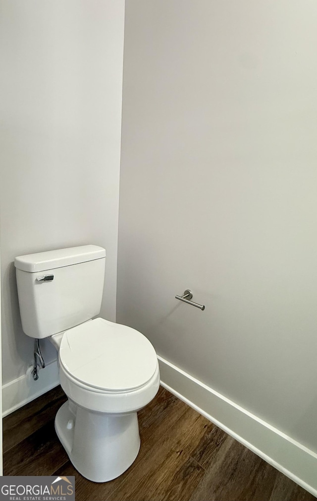 270 Meadow Crest Dr, Cleveland, GA 30528 - bathroom featuring baseboards, wood finished floors, and toilet