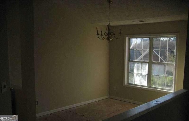 2918 Egret Ln, Austell, GA 30106 - unfurnished dining area with a chandelier and baseboards