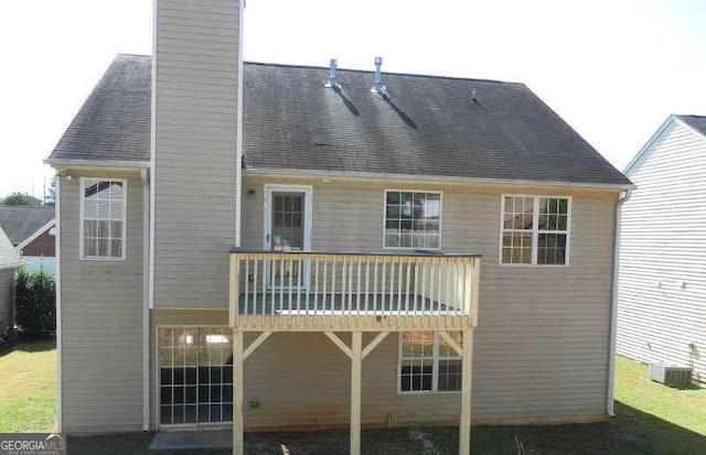 2918 Egret Ln, Austell, GA 30106 - back of house featuring a chimney and central AC unit