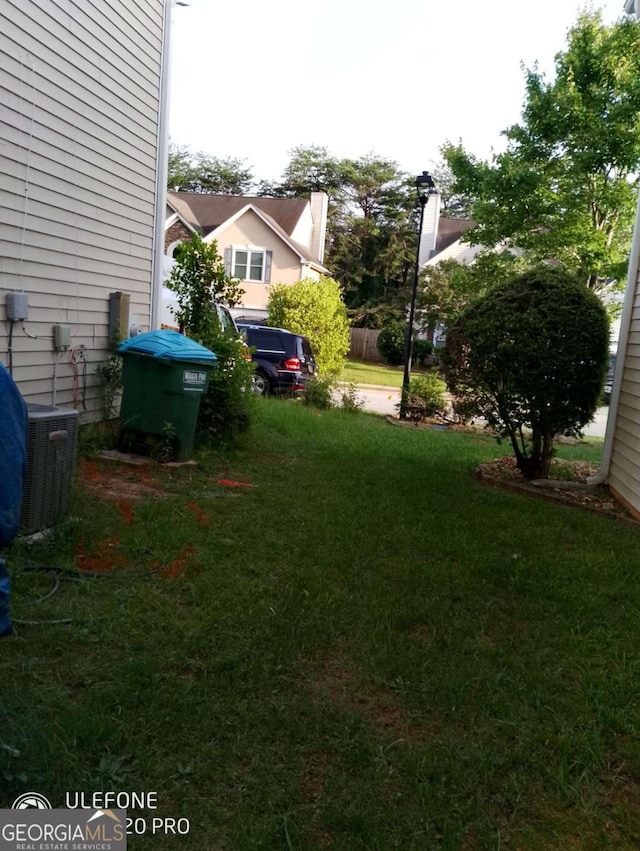 2918 Egret Ln, Austell, GA 30106 - view of grassy yard with central AC unit