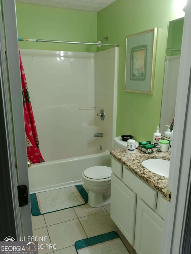 2918 Egret Ln, Austell, GA 30106 - full bath featuring vanity, shower / bathtub combination with curtain, tile patterned flooring, and toilet