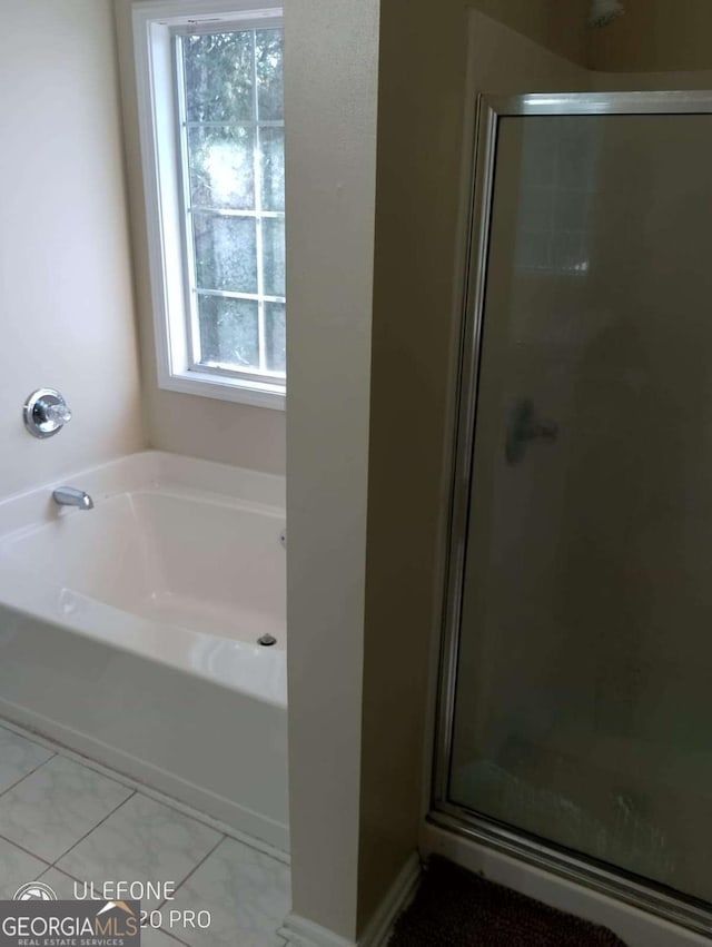 2918 Egret Ln, Austell, GA 30106 - bathroom with a stall shower and a bath
