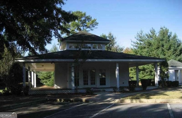 2918 Egret Ln, Austell, GA 30106 - view of front facade featuring covered porch and french doors