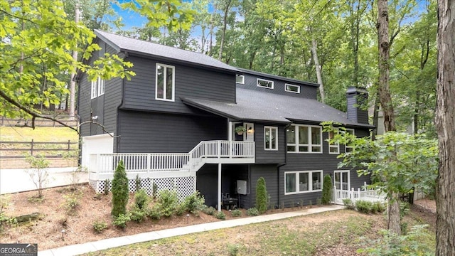 510 Watergate Ct, Roswell, GA 30076 - back of property featuring a chimney and roof with shingles