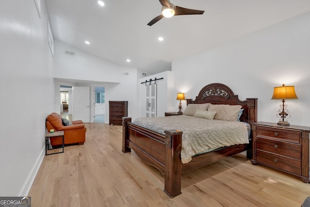 510 Watergate Ct, Roswell, GA 30076 - bedroom featuring a barn door, lofted ceiling, light wood-type flooring, recessed lighting, and a ceiling fan