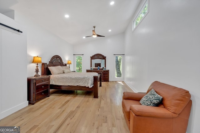 510 Watergate Ct, Roswell, GA 30076 - bedroom featuring light wood-style floors, recessed lighting, high vaulted ceiling, ceiling fan, and a barn door