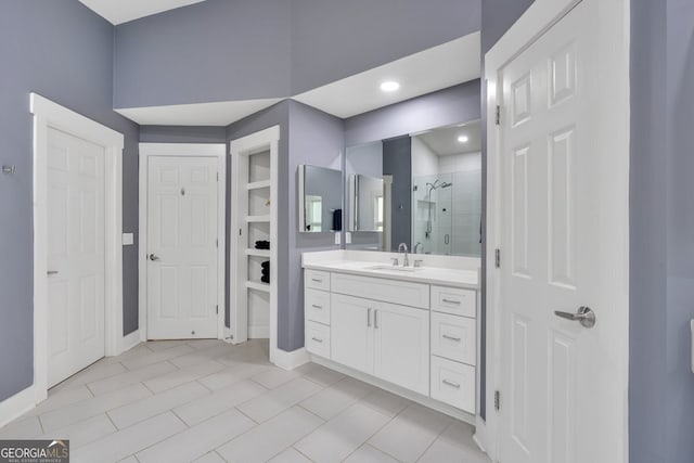 510 Watergate Ct, Roswell, GA 30076 - bathroom featuring a stall shower, vanity, tile patterned flooring, and recessed lighting
