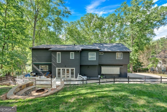 510 Watergate Ct, Roswell, GA 30076 - back of house featuring a deck, an outdoor fire pit, a yard, and french doors