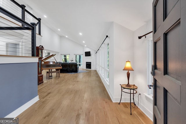 510 Watergate Ct, Roswell, GA 30076 - hallway with high vaulted ceiling, light wood-type flooring, and recessed lighting