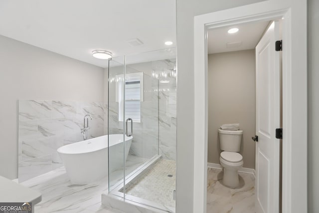 3189 Jackson Unit A, Hapeville, GA 30354 - full bath featuring marble tiled flooring, a freestanding bath, a marble finish shower, and recessed lighting