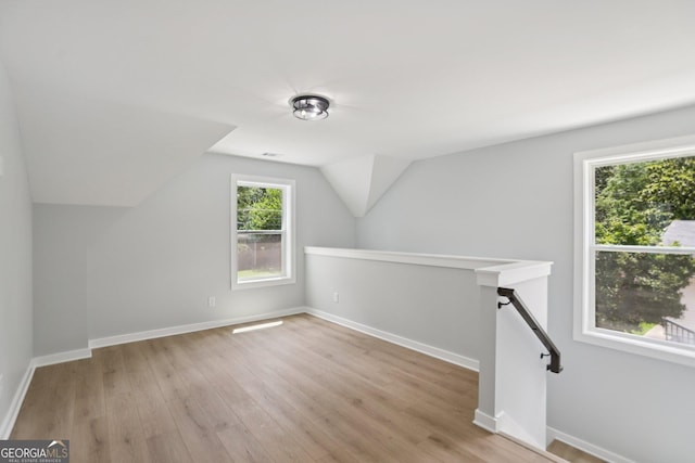 3189 Jackson Unit A, Hapeville, GA 30354 - additional living space featuring light wood-style floors and vaulted ceiling