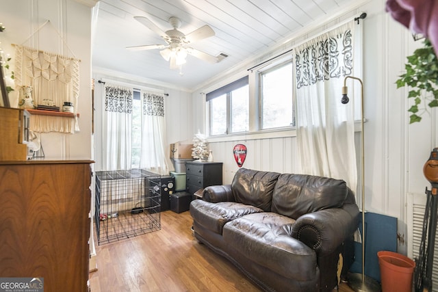 331 Corbin Ave, Macon, GA 31204 - living room with wood finished floors, ceiling fan, and crown molding