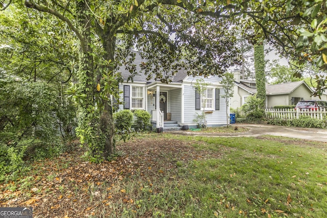331 Corbin Ave, Macon, GA 31204 - view of property hidden behind natural elements featuring concrete driveway