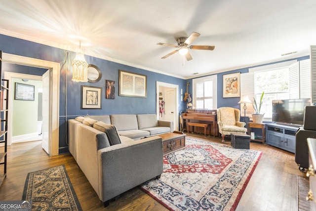 331 Corbin Ave, Macon, GA 31204 - living room featuring wood finished floors, a ceiling fan, crown molding, a chandelier, and baseboards