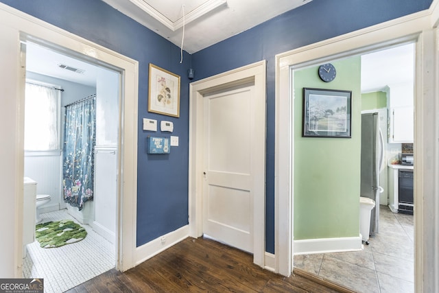 331 Corbin Ave, Macon, GA 31204 - hall featuring baseboards, attic access, and wood finished floors