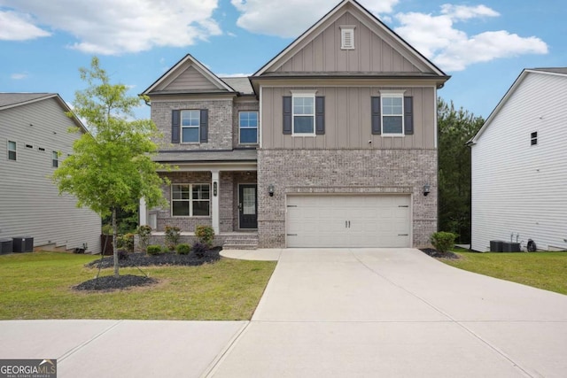 106 Logan Pass Dr, Loganville, GA 30052 - craftsman-style house featuring board and batten siding, brick siding, a front lawn, and driveway