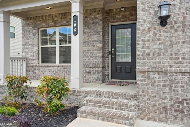 106 Logan Pass Dr, Loganville, GA 30052 - entrance to property with a porch and brick siding
