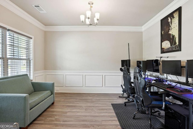106 Logan Pass Dr, Loganville, GA 30052 - office space featuring a chandelier, ornamental molding, a wainscoted wall, and light wood-type flooring