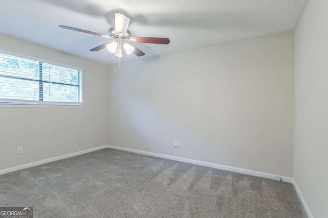 2290 Pope Rd, Douglasville, GA 30135 - carpeted spare room with a ceiling fan and baseboards