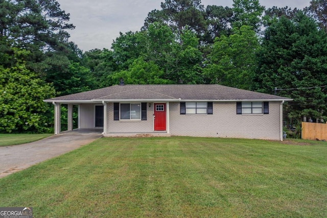 2290 Pope Rd, Douglasville, GA 30135 - single story home with driveway, a front lawn, brick siding, and a carport