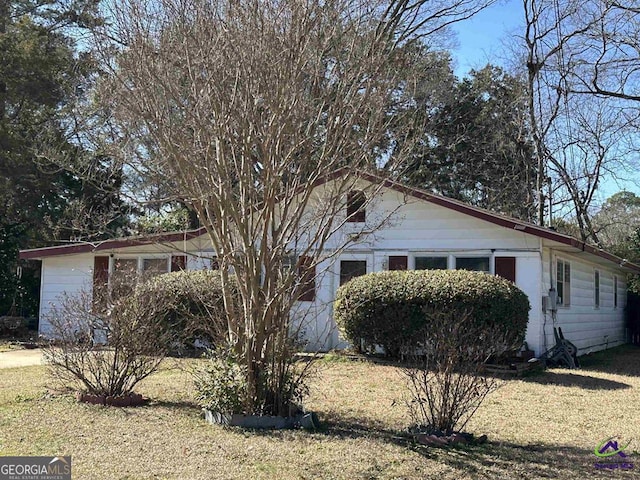 204 Doyle St, Warner Robins, GA 31093 - view of front of home with a front lawn
