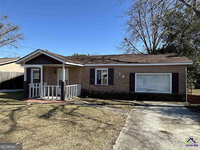 204 Doyle St, Warner Robins, GA 31093 - ranch-style house featuring brick siding and roof with shingles
