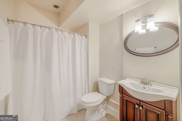 3623 Terrah Point Dr, Duluth, GA 30097 - bathroom with toilet, vanity, tile patterned floors, and baseboards