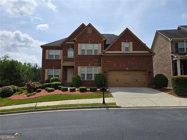3623 Terrah Point Dr, Duluth, GA 30097 - view of front of house featuring brick siding, driveway, and a garage