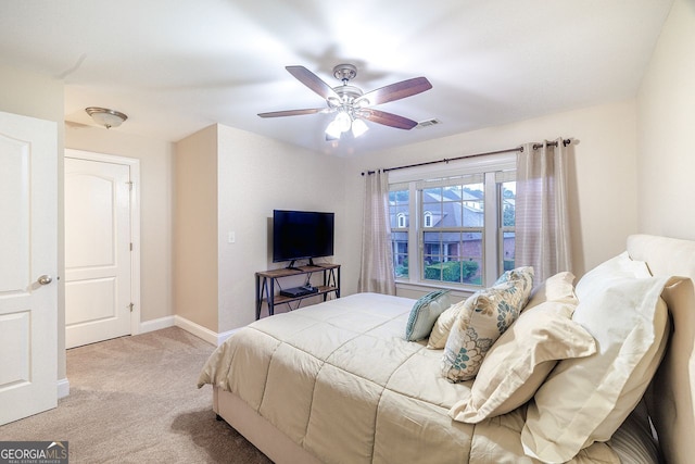 3623 Terrah Point Dr, Duluth, GA 30097 - bedroom featuring light carpet, baseboards, and a ceiling fan