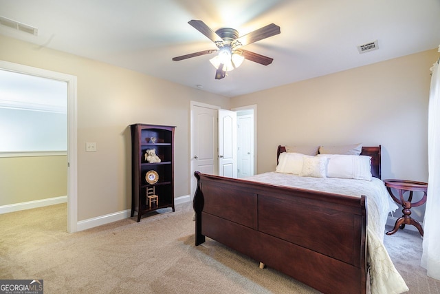 3623 Terrah Point Dr, Duluth, GA 30097 - bedroom featuring light carpet, baseboards, and a ceiling fan