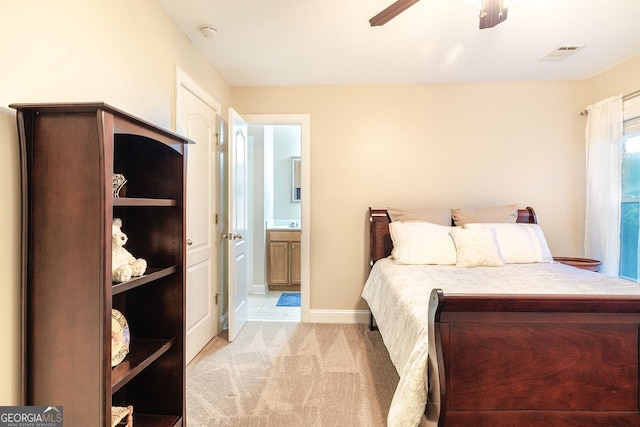 3623 Terrah Point Dr, Duluth, GA 30097 - bedroom featuring light carpet, ensuite bath, a ceiling fan, and baseboards