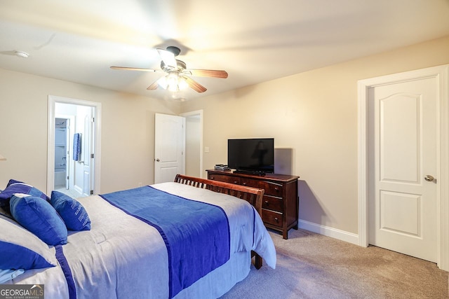 3623 Terrah Point Dr, Duluth, GA 30097 - carpeted bedroom featuring ceiling fan, ensuite bath, and baseboards