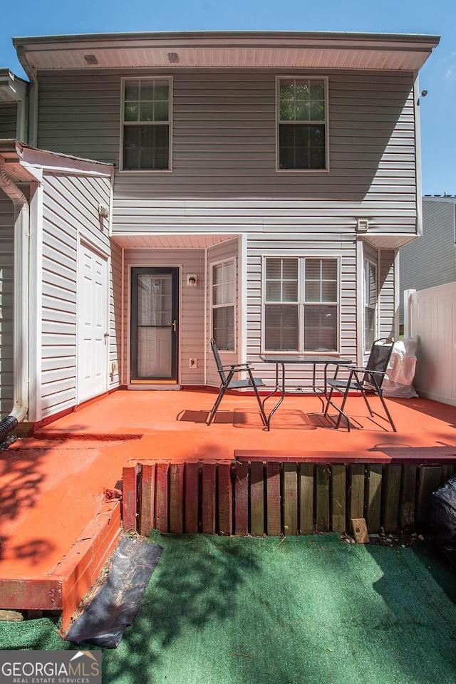 1346 Revelstoke Cv, Riverdale, GA 30296 - rear view of house with a deck