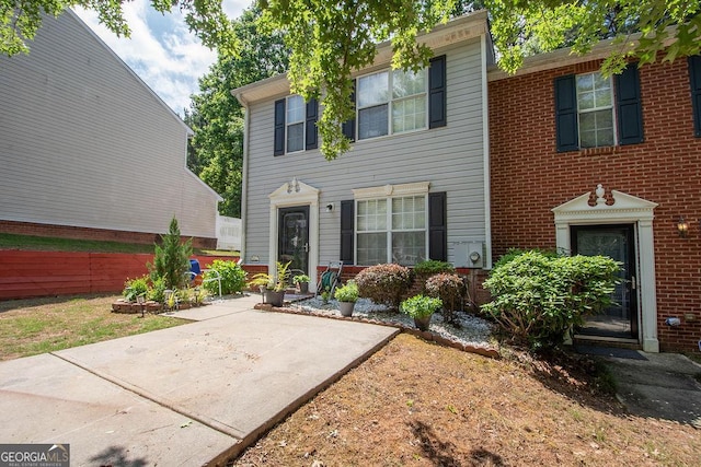 1346 Revelstoke Cv, Riverdale, GA 30296 - view of front facade with a patio