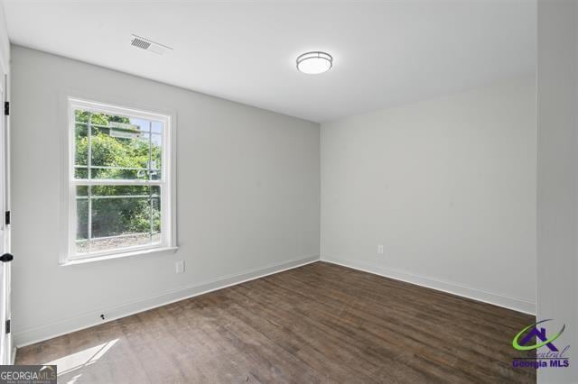 116 Fred Ct, Macon, GA 31216 - unfurnished room featuring dark wood-style floors and baseboards