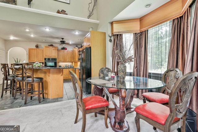 226 Long Island Dr, Whitesburg, GA 30185 - dining area with arched walkways, ceiling fan, and recessed lighting