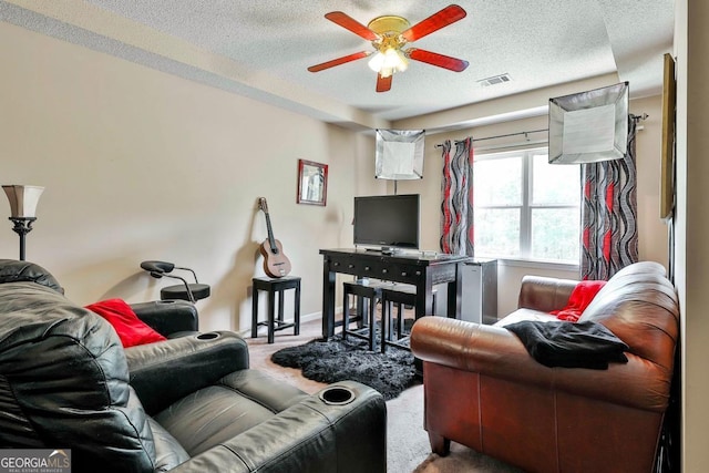 226 Long Island Dr, Whitesburg, GA 30185 - living area featuring carpet floors, ceiling fan, and a textured ceiling