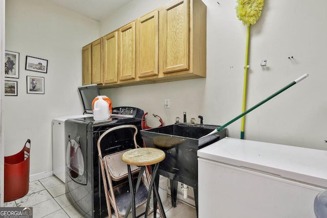 226 Long Island Dr, Whitesburg, GA 30185 - washroom featuring cabinet space, separate washer and dryer, and light tile patterned flooring